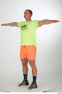 Joel dressed green sneakers orange shorts sports standing t-pose whole…